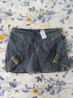 Washed Denim Mini Skirt with Crisscross Buckle Straps and Built-in Shorts